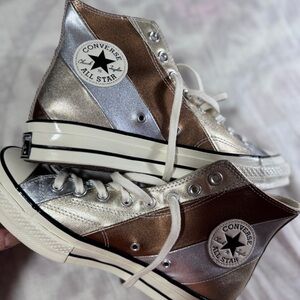 Converse leather high tops in “Vintage 70’s Metallic”.